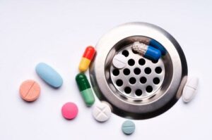 Medications being stopped in a drain trap