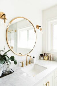 gold mirror in remodeled small bathroom in salt lake city